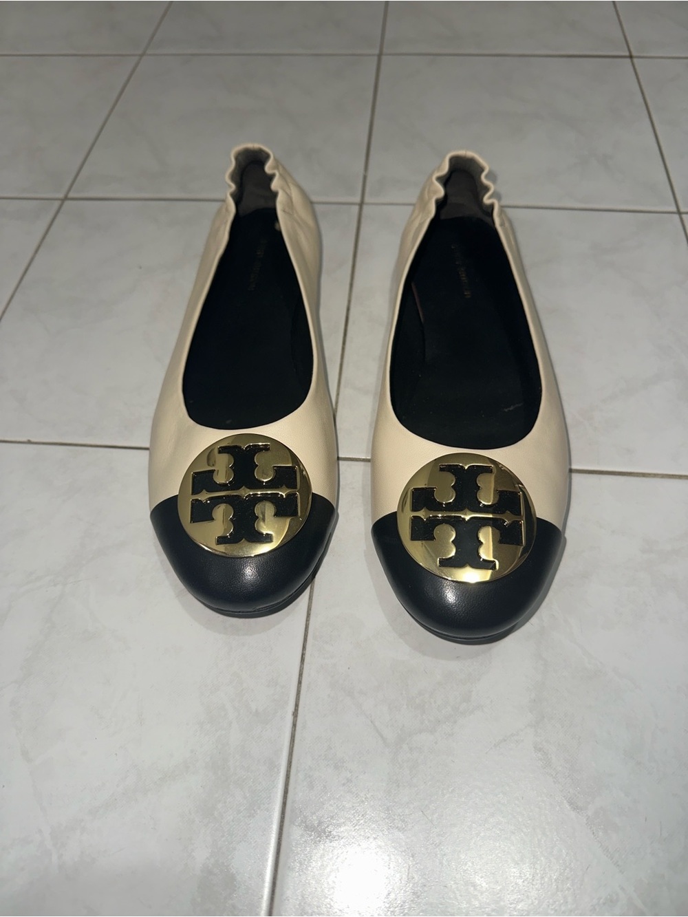 Tory Burch Two-Tone Leather Ballet Flats in Cream and Black with Gold Logo